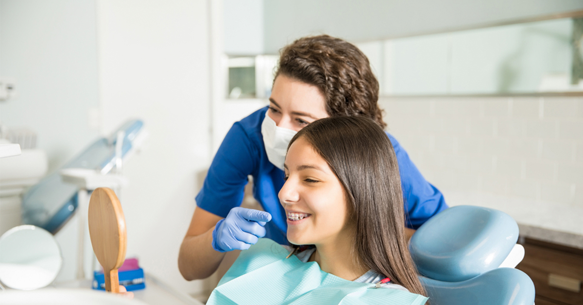 Clínicas Den - ¿Cómo es una mordida perfecta y cómo conseguirla con tratamientos de ortodoncia?